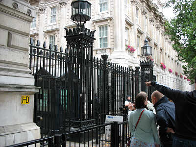 Gate and guards keep curiosity seekers, political opponents and terrorists out of Downing Street, location of the Prime Minister's residence